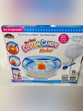 Cotton Candy Maker - Blue, White & Orange see details picture no accessories.